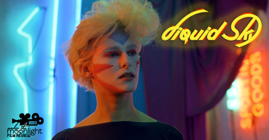 Woman with weird makeup looking on.