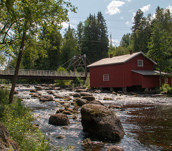 A red house in Jokelan mylly, Finland. Source: Unsplash - Rural Explorer