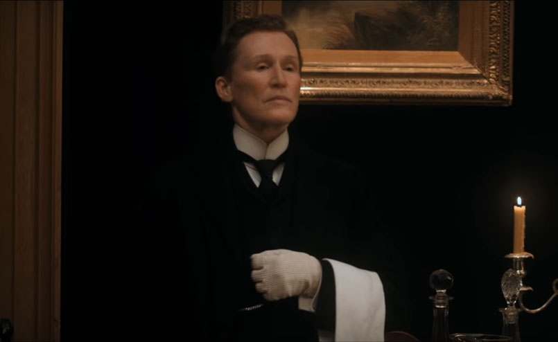 Screenshot of Albert Nobbs (2011). Albert Nobbs on the job in the dining area at the hotel.