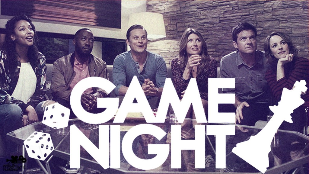 The couples sitting on a couch.