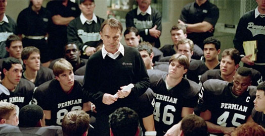 Screenshot of Friday Night Lights (2004) with Billy Bob Thornton giving an inspirational speech to the team.