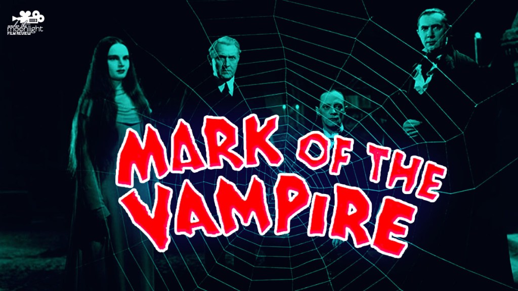 People around looking at a large spider web.