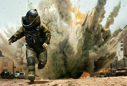 Sergeant First Class William James running away from an explosion filled with smoke, dirt and fire in daylight.