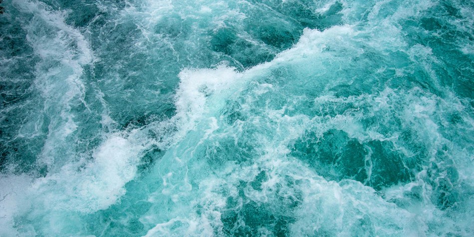 banner - crashing ocean water